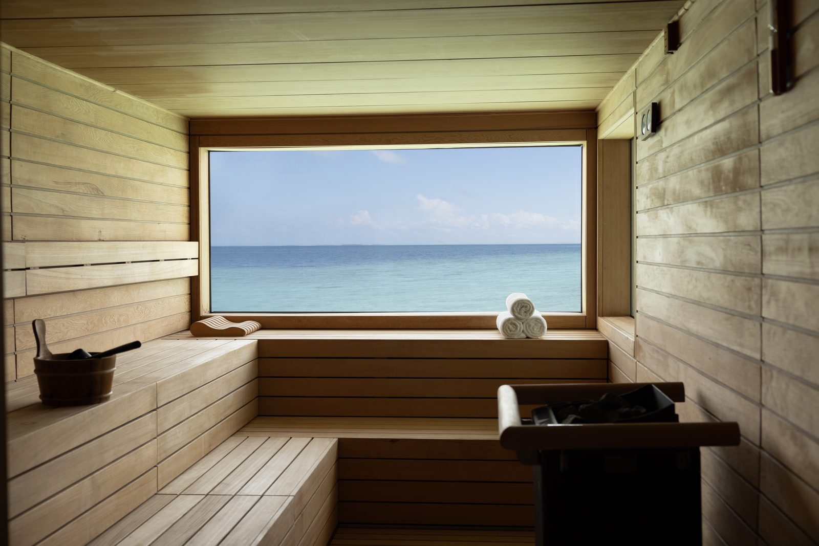 Wooden sauna with an ocean view at Waldorf Astoria Maldives